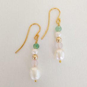 Sine �reringe i guld