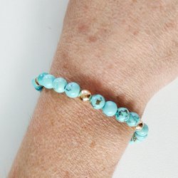 Valkyrie armb�nd med turkis i guld